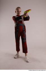 DENISA PILOT STANDING POSE WITH GUN 3